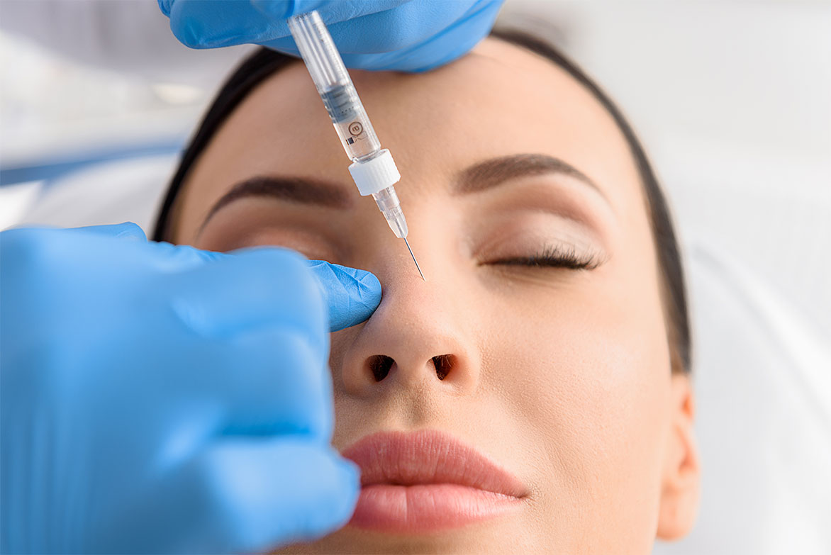 A woman getting nose filler injection